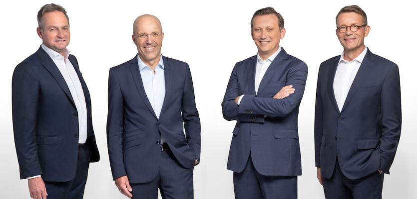 Der Vorstand der Rewe Group: Sören Hartmann, Jan Kunath, Lionel Souque, Dr. Christian Mielsch